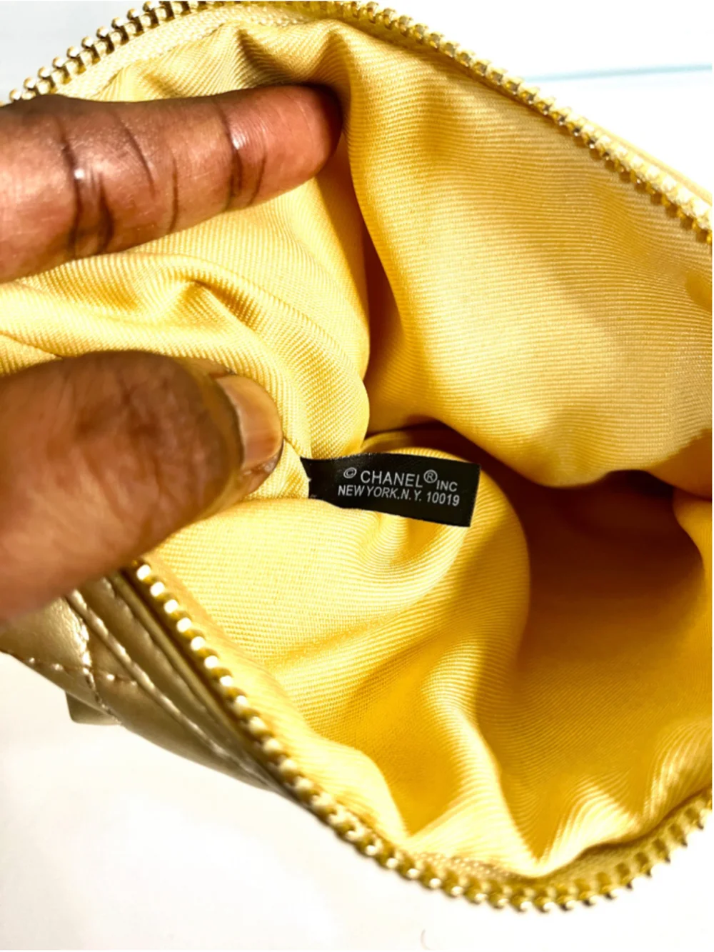 Chanel Makeup quilted gold pouch